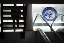 A man walks down the stairs at the headquarters of the General Directorate for External Security (DGSE), France's external intelligence agency, in Paris on June 4, 2015. AFP PHOTO / MARTIN BUREAU (Photo by Martin BUREAU / AFP)