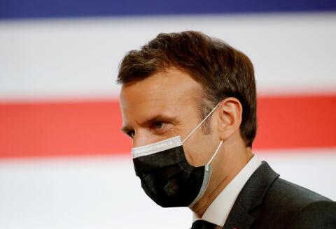 French President Emmanuel Macron wears a face mask during the launching of the French Strategic Council for the Healthcare Industries (CSIS) meeting at the Elysee Palace in Paris, France on June 29, 2021. / AFP / POOL / SARAH MEYSSONNIER 
