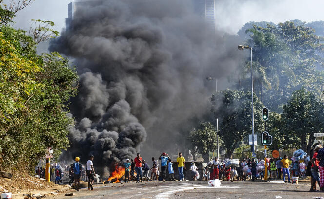 Rioters outside a shopping mall in Durban, South Africa, Monday 12 July 2021.