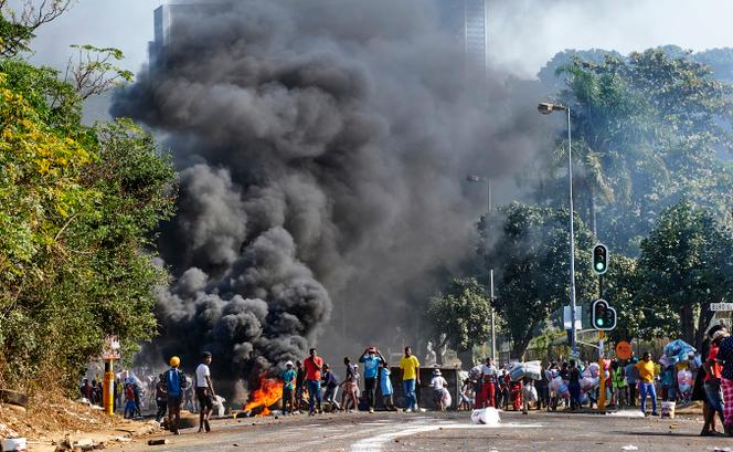 Rioters outside a shopping mall in Durban, South Africa, Monday 12 July 2021.