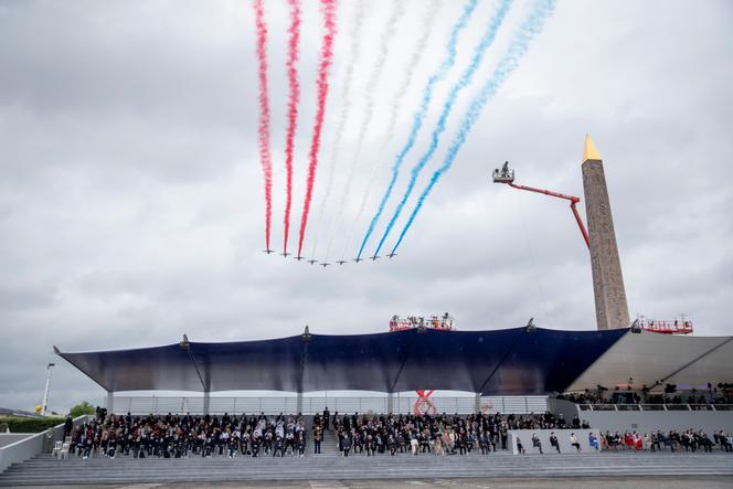 The air parade during the military ceremony of the National Day on the Champs Elysées in Paris, Tuesday July 14, 2021.