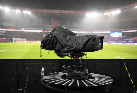 A camera of Spanish media group Mediapro is seen prior to during the French L1 football match between Paris Saint-Germain (PSG) and Lyon (OL), on December 13, 2020 at the Parc des Princes stadium in Paris. (Photo by FRANCK FIFE / AFP)
