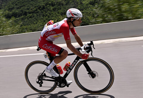 Team Cofidis' Guillaume Martin of France rides during the 15th stage of the 108th edition of the Tour de France cycling race, 191 km between Ceret and Andorre-La-Vieille, on July 11, 2021. (Photo by Anne-Christine POUJOULAT / AFP)