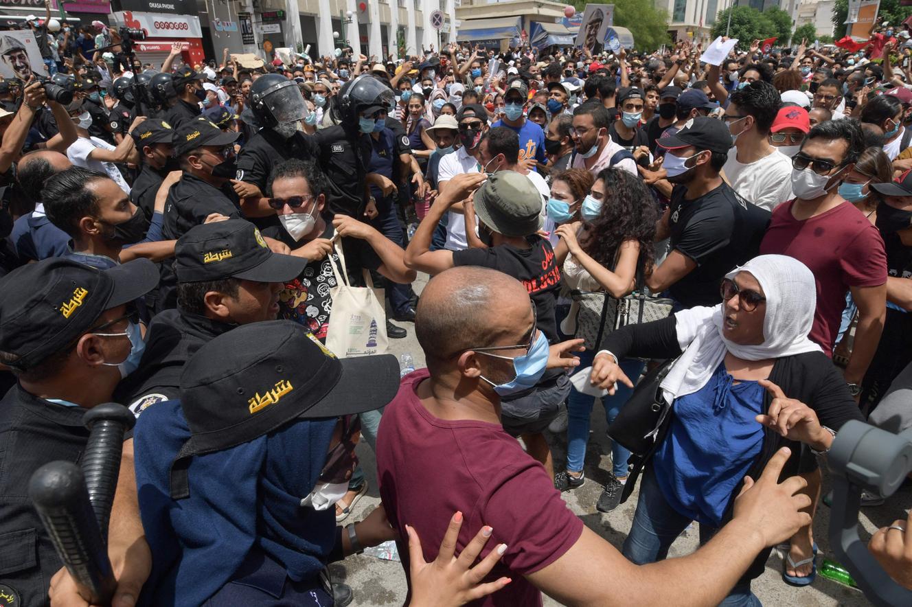 Anti-government protesters gathered in front of the Tunisian parliament on July 25, 2021.