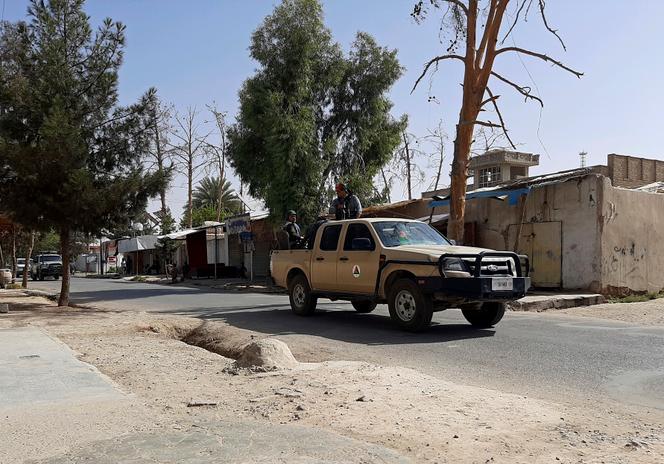 Afghan forces patrol a deserted street in Lashkar Gah, Helmand province, Afghanistan on August 3.