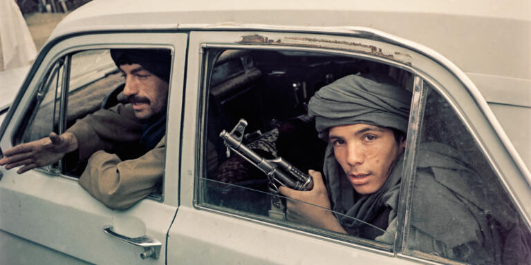 Kabul, Afghanistan
October 19, 1996. 

Taliban police or soldiers of a mobile unit patrol near the Darulaman Palace.

PHOTOGRAPH by ALAN CHIN