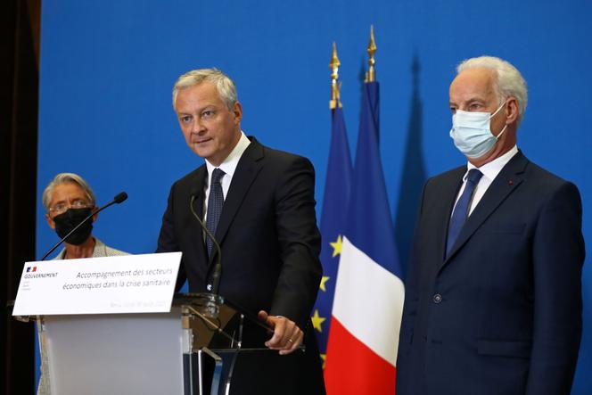 Le ministre de l’économie et des finances, Bruno Le Maire, la ministre du travail, Elisabeth Borne, et le ministre délégué, chargé des petites et moyennes entreprises, Alain Griset, à Bercy, le 30 août 2021.