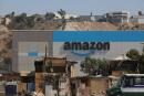 Shacks are seen at an informal settlement next the new Amazon fulfillment center, which is under construction at the RMSG Alamar Industrial Park, in Tijuana, Mexico September 7, 2021. Picture taken September 7, 2021. REUTERS/Jorge Duenes