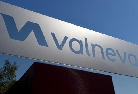 The logo of Valneva SE Group is pictured at the company's headquarters in Saint-Herblain, near Nantes, western France, on July 30, 2020. - Could the Covid-19 vaccine be found by a biotechnology company in western France, far from major global research centers? The hypothesis is more than plausible for the British government, which has just signed an important agreement with it. (Photo by JEAN-FRANCOIS MONIER / AFP)