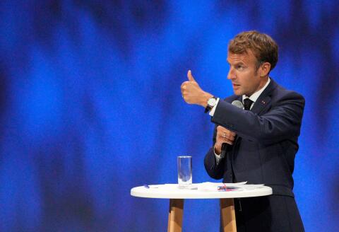 French President Emmanuel Macron gestures as he speaks during the Sea Economy meeting in Nice, southern France, on September 14, 2021. (Photo by Daniel Cole / POOL / AFP)
