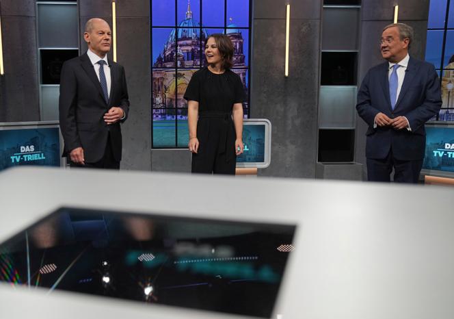 Chancellor candidates Olaf Scholz (SPD), Annalena Baerbock (Greens) and Armin Laschet (CDU-CSU) on the stage of the debate organized by the channels Sat 1 and Kabel Eins, on September 26, in Berlin.