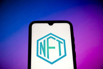 In this photo illustration, a NFT (Non-fungible token) logo seen displayed on a smartphone. (Photo by Rafael Henrique / SOPA Images/Sipa USA)No Use Germany.
