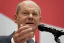 FILE - In this Monday, Sept. 27, 2021 file photo, Olaf Scholz, top candidate for chancellor of the Social Democratic Party (SPD), speaks during a press conference at the party's headquarters in Berlin. As Europe's economic powerhouse Germany embarks on the task of piecing together a new ruling coalition after the knife-edge election on Sunday Sept. 26, 2021, the country need only look to its neighbors, Belgium and the Netherlands, to see how tricky the process can be. (AP Photo/Michael Sohn, file)