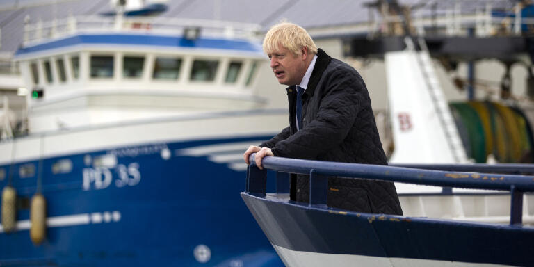 Britain's Prime Minister Boris Johnson looks on from aboard the Opportunis IV fishing trawler during a visit to  Peterhead in Scotland on September 6, 2019. - Prime Minister Boris Johnson heads to Scotland on Friday in campaign mode despite failing to call an early election after MPs this week thwarted his hardline Brexit strategy. (Photo by Duncan McGlynn / POOL / AFP)