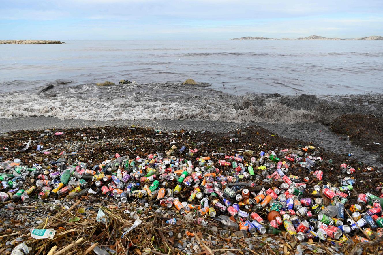 A Marseille beach buried under garbage after torential rains on Monday, October 5.