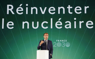 French President Emmanuel Macron speaks during the presentation of "France 2030" investment plan at the Elysee Palace in Paris, Tuesday Oct. 12, 2021.French President Emmanuel Macron details the priority sectors of the "France 2030" plan to "bring out the champions of tomorrow". Behind reads: Reinvent nuclear energy. (Ludovic Marin, Pool Photo via AP)