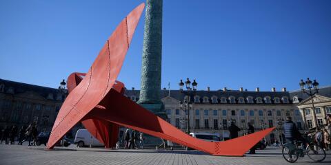 "Flying Dragon", an artwork by US sculptor Alexander Calder is on display as part of a preview of the FIAC, French acronym for "Paris International Contemporary Art Fair" at Place Vendome, on October 16, 2021 in Paris. RESTRICTED TO EDITORIAL USE - MANDATORY MENTION OF THE ARTIST UPON PUBLICATION - TO ILLUSTRATE THE EVENT AS SPECIFIED IN THE CAPTION (Photo by JULIEN DE ROSA / AFP) / RESTRICTED TO EDITORIAL USE - MANDATORY MENTION OF THE ARTIST UPON PUBLICATION - TO ILLUSTRATE THE EVENT AS SPECIFIED IN THE CAPTION
