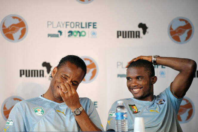 Didier Drogba and Samuel Eto'o during a press conference in Saint-Gratien, near Paris, in May 2010.