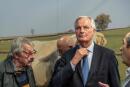 Les Republicains (LR) Presidential candidate Michel Barnier (C) looks on during the inauguration of the 10,000 square metre Hall 2 at the 30th "Sommet de l'elevage" (Livestock Summit) Trade fair in Cournon-d'Auvergne, near Clermont-Ferrand, central France, on October 7, 2021. (Photo by Thierry ZOCCOLAN / AFP)