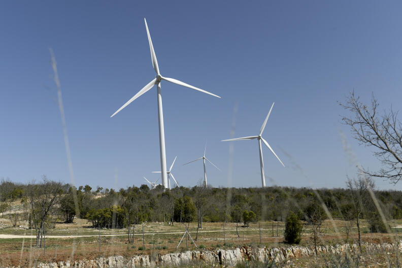 This photograph shows a wind turbines, near Ollieres, southern France, on April 1, 2021. - The Marseille Administrative Court of Appeal confirms on March 31, 2021 the nullity of the environmental authorisation previously issued to the 22 wind turbines recently built in the foothills of Mont Sainte-Victoire. (Photo by Nicolas TUCAT / AFP)