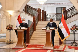 A handout picture released by the Egyptian Presidency's official Facebook page on March 6, 2021 shows Egyptian President Abdel Fattah al-Sisi (L) and Sudan's Sovereign Council chief General Abdel Fattah al-Burhan (R) giving a joint press conference in Sudan's capital Khartoum. - Egyptian President Abdel Fattah al-Sisi warned against Ethiopia continuing to fill its Nile dam, on his first visit to Sudan since the ouster of longtime autocrat Omar al-Bashir nearly two years ago. (Photo by EGYPTIAN PRESIDENCY / AFP) / === RESTRICTED TO EDITORIAL USE - MANDATORY CREDIT "AFP PHOTO / HO / EGYPTIAN PRESIDENCY' - NO MARKETING NO ADVERTISING CAMPAIGNS - DISTRIBUTED AS A SERVICE TO CLIENTS ==