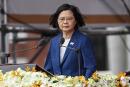(FILES) In this file photo taken on October 09, 2021 Taiwan's President Tsai Ing-wen speaks during national day celebrations in front of the Presidential Palace in Taipei. Taiwan's president said October 27, 2021 she has "faith" the United States would defend the island against a Chinese attack, as Beijing and Washington trade barbs over Taipei's place on the global stage. Tsai Ing-wen also confirmed for the first time that US troops were training Taiwanese forces on the island in an interview with CNN broadcast Wednesday -- an initiative first confirmed to AFP by a Pentagon official earlier this month. (Photo by Sam Yeh / AFP)