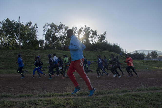 Young runners follow their daily training, in the highlands of Bekoji (Ethiopia), in October 2021.