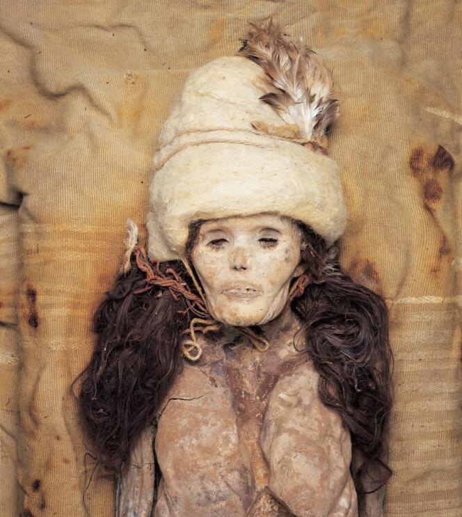 Caption: A naturally mummified female from burial M11 of the Xiaohe cemetery.