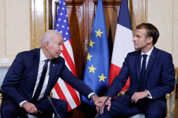 French President Emmanuel Macron (R) and US President Joe Biden (L) meet at the French Embassy to the Vatican in Rome on October 29, 2021. (Photo by Ludovic MARIN / AFP)