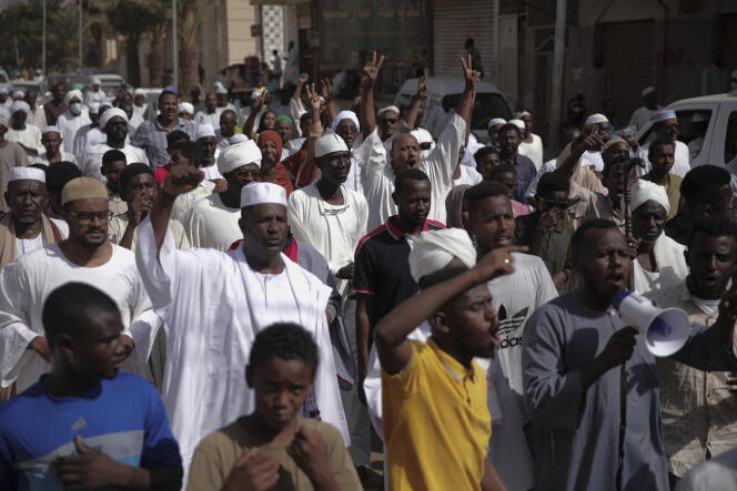 People protest in Khartoum, Sudan, after a military coup earlier this week, Thursday, October 29, 2021.