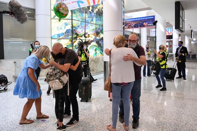 A moving reunion at Sydney Airport on November 1, 2021, after the borders reopened for the first time since March 20, 2020.