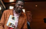 Senegalese novelist Mohamed Mbougar Sarr poses for the press after being awarded with the Prix Goncourt literary prize for his novel "La plus secrete memoire des hommes" (Mankind most secret memory), in Paris on November 3, 2021. (Photo by Bertrand GUAY / AFP)