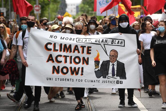 Un rassemblement lors d’une journée mondiale d’action contre le changement climatique à Melbourne, en Australie, le 6 novembre 2021.