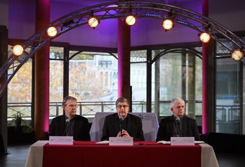 Bishop of Creteil and CEF Vice-President Dominique Blanchet (L), Archbishop of Reims and CEF President Eric de Moulins-Beaufort (C), and Bishop of Arras and CEF Vice-President Olivier Leborgne (R) give a press conference during the Conference des Eveques de France (CEF - French Bishops' Conference) in Lourdes, southwestern France, on November 8, 2021. The annual meeting of bishops begins on November 2, 2021 in Lourdes where they have a week to reflect on the follow-up to be given to the revelations of the Sauve report, a month after its publication, on the extent of child crime in the Catholic Church. (Photo by Valentine CHAPUIS / AFP)