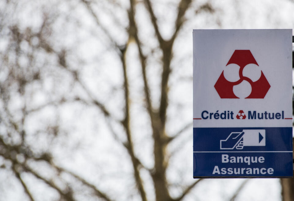 This photograph taken on February 17, 2020, shows the logo of the Credit Mutuel bank and insurance in Nantes, western France. (Photo by Loic VENANCE / AFP)