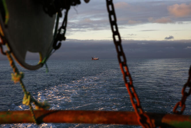 A French fishing boat is seen at the limits of Franco-British waters, from the trawler