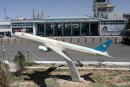 FILE PHOTO: A model of an Ariana Afghan Airlines jet is seen in front of the international airport in Kabul, Afghanistan, September 5, 2021. WANA (West Asia News Agency) via REUTERS ATTENTION EDITORS - THIS IMAGE HAS BEEN SUPPLIED BY A THIRD PARTY/File Photo