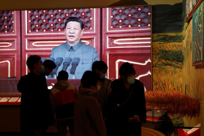 A giant screen projects an image of Chinese President Xi Jinping at the Chinese Communist Party Museum in Beijing on Thursday, November 11, 2021.