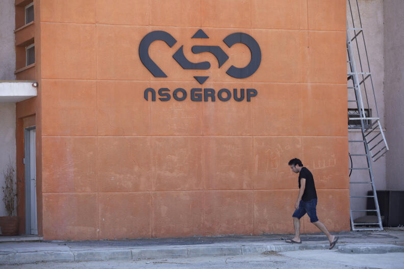 FILE - A logo adorns a wall on a branch of the Israeli NSO Group company, near the southern Israeli town of Sapir, Aug. 24, 2021. The Palestinian Foreign Ministry on Thursday, Nov. 11, said it has detected spyware developed by the Israeli hacker-for-hire company NSO Group on the phones of three senior officials and accused Israel of using the military-grade Pegasus software to eavesdrop on them. (AP Photo/Sebastian Scheiner, File)