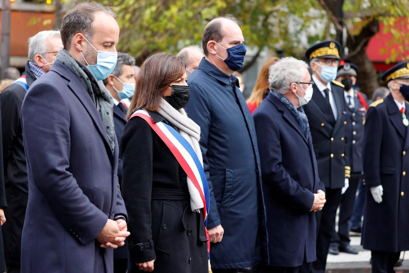 The prime minister, Jean Castex, the mayor of Paris, Anne Hidalgo, and the president of the association of victims Life for Paris, Arthur Dénouveaux, gather in front of the bar La Bonne Bière to pay tribute to the victims of the terrorist attacks of November 13 2015.