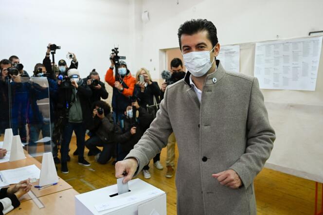 Centrist Kiril Petkov, former acting economy minister, slips his ballot into a ballot box for the presidential and parliamentary elections in Bulgaria, in Sofia, on November 14, 2021.