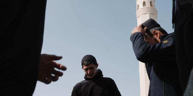 Muslims are entering Imom Termiziy mosque for a Friday namaz, Termez