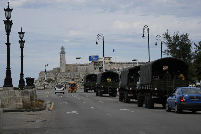 Army trucks patrol Havana, Cuba on November 15, 2021.
