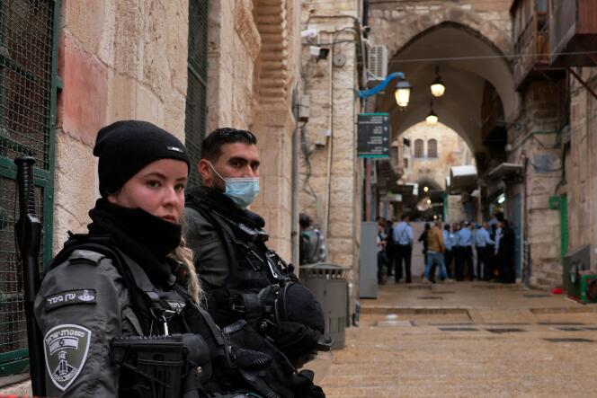 Israeli border guards secure the perimeter around the scene of the attack in Jerusalem's Old City on November 21, 2021.