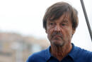 Honorary President of the Nicolas Hulot Foundation, and France's former Environment Minister Nicolas Hulot stands on the sailboat "7th continent" to sail to the Calanques National Park, during the IUCN World Conservation Congress as part of a three-day visit of France's President Emmanuel Macron to Marseille, Southern France, on September 3, 2021. - Macron unveiled a 1.5 billion euro plan on September 2, 2021 to help Marseille tackle crime and deprivation, as the southern city's woes rise up the agenda ahead of elections next year. (Photo by Ludovic MARIN / AFP)