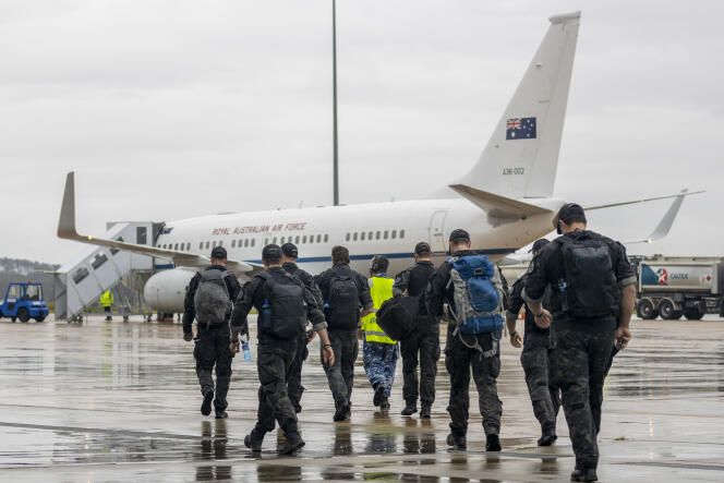 Des forces des opérations spéciales australiennes s’apprêtent à quitter Canberra pour les îles Salomon, le 25 novembre 2021.