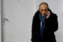 (FILES) In this file photo taken on November 27, 2021 French far-right media pundit Eric Zemmour speaks on his phone during a visit in Marseille, southern France. Eric Zemmour is set to announce his candidacy for the presidential elections on November 30, around midday according to his entourage. (Photo by Nicolas TUCAT / AFP)