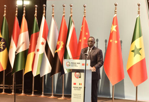 Senegalese President Macky Sall delivers his speech during the China-Africa Cooperation (FOCAC) meeting at the Diamniadio in Dakar, Senegal, on November 29, 2021. - China's President Xi Jinping on November 29, 2021 pledged to offer one billion Covid-19 vaccine doses to Africa, in a speech made via videolink to a China-Africa summit near Senegal's capital Dakar. (Photo by SEYLLOU / AFP)