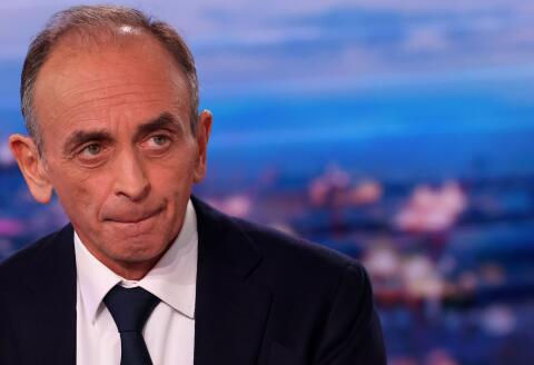 French far-right media pundit and 2022 presidential candidate Eric Zemmour reacts prior taking part in the evening news broadcast of French TV channel TF1 in Boulogne-Billancourt, outside Paris, on November 30, 2021. Zemmour announced his candidacy for France's 2022 presidential election in a video broadcast on his Youtube channel on November 30, 2021. (Photo by Thomas COEX / POOL / AFP)