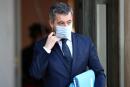 French Interior Minister Gerald Darmanin removes his protective face mask as he leaves following the weekly cabinet meeting at the Elysee Palace in Paris, France, December 1, 2021. REUTERS/Sarah Meyssonnier